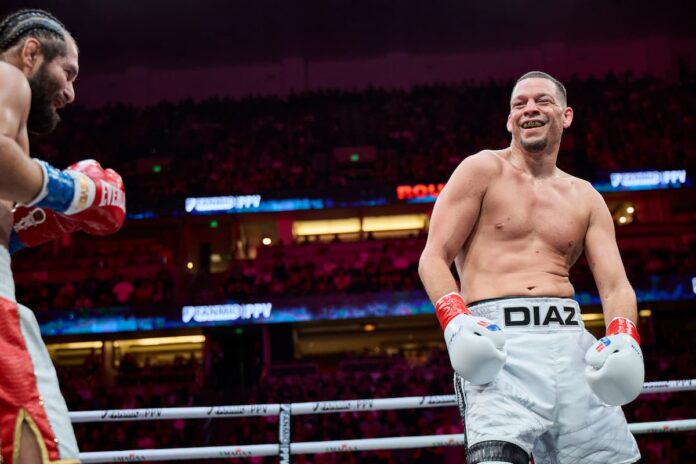 Nate Diaz defeats Jorge Masvidal in a boxing match