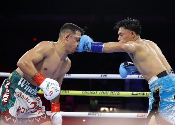 Angelo Leo KO's Luis Alberto Lopez to become two-division champion