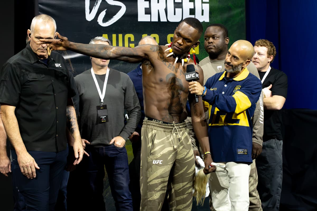 Israel Adesanya and Jon Anik