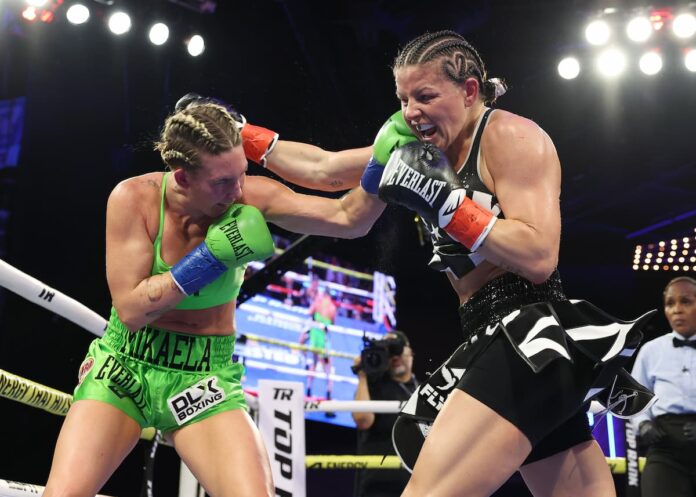 Mikaela Mayer defeats Sandy Ryan to become two-weight champion