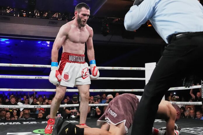 Bakhram Murtazaliev sends Tim Tszyu to the canvas in title fight in Orlando