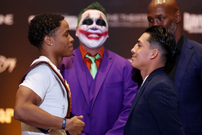 Floyd Schofield and Rene Tellez Giron come face to face at the press conference