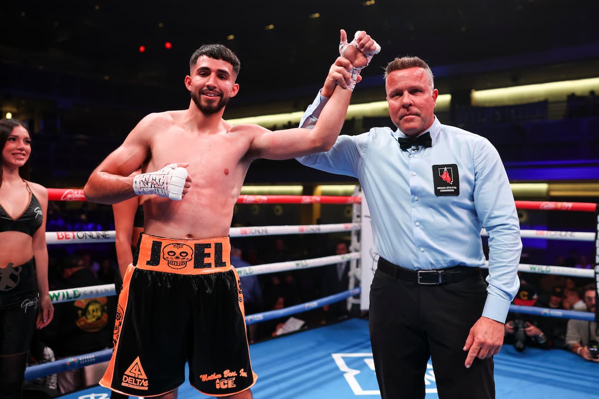 Joel Iriarte and referee Thomas Taylor