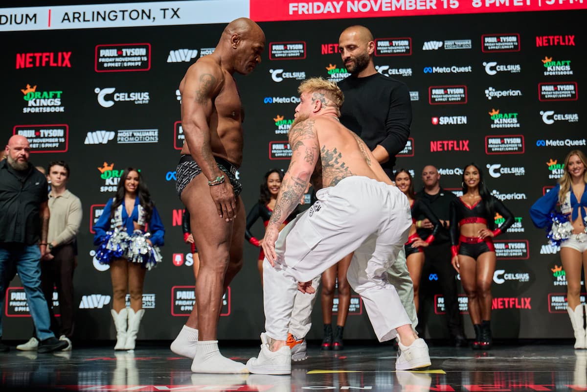 Mike Tyson and Jake Paul go face to face at the weigh-ins ahead of their boxing match