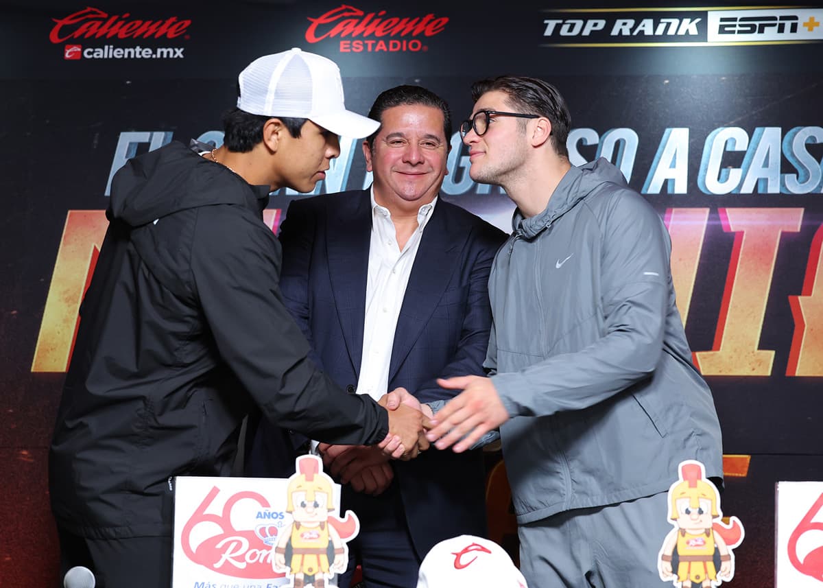 Jaime Munguia and Bruno Surace shake hands