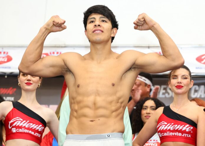 Jaime Munguia weighs-in for his bout against Bruno Surace