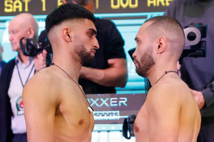 Adam Azim and Sergey Lipinets face each other at the weigh-in ceremony ahead of their boxing bout in London