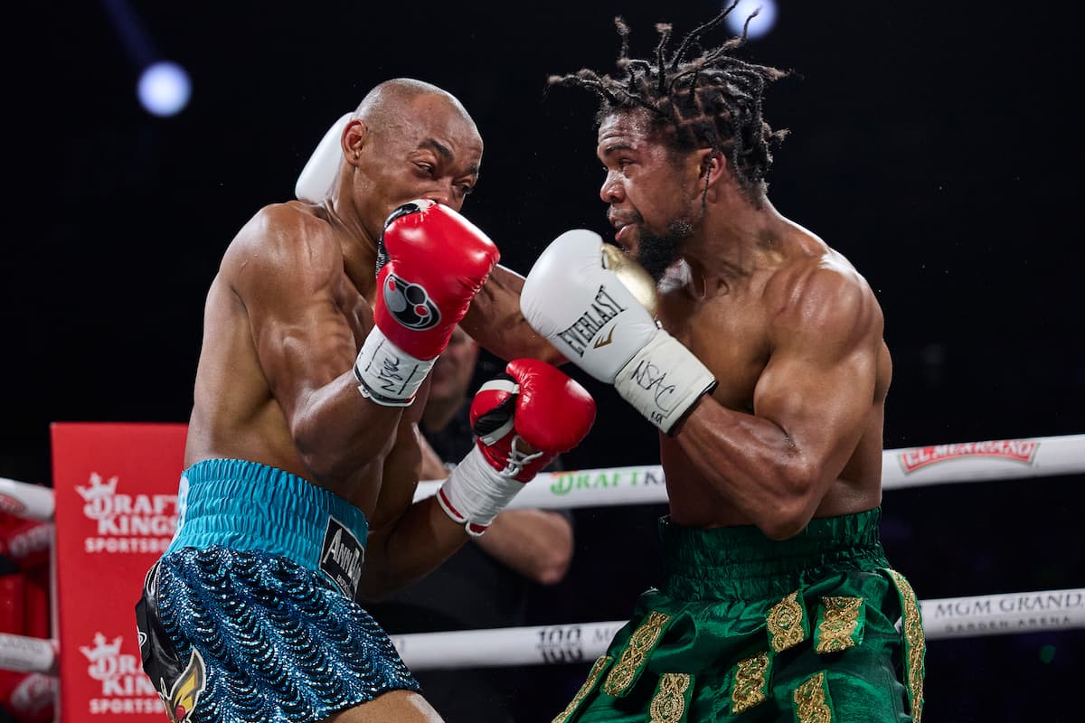 Gary Antuanne Russell and Alberto Puello during their bout