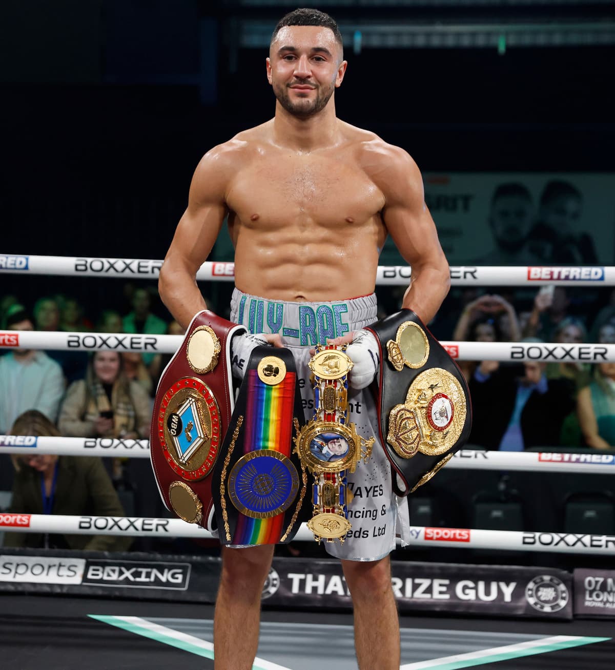 Callum Simpson with his championship belts