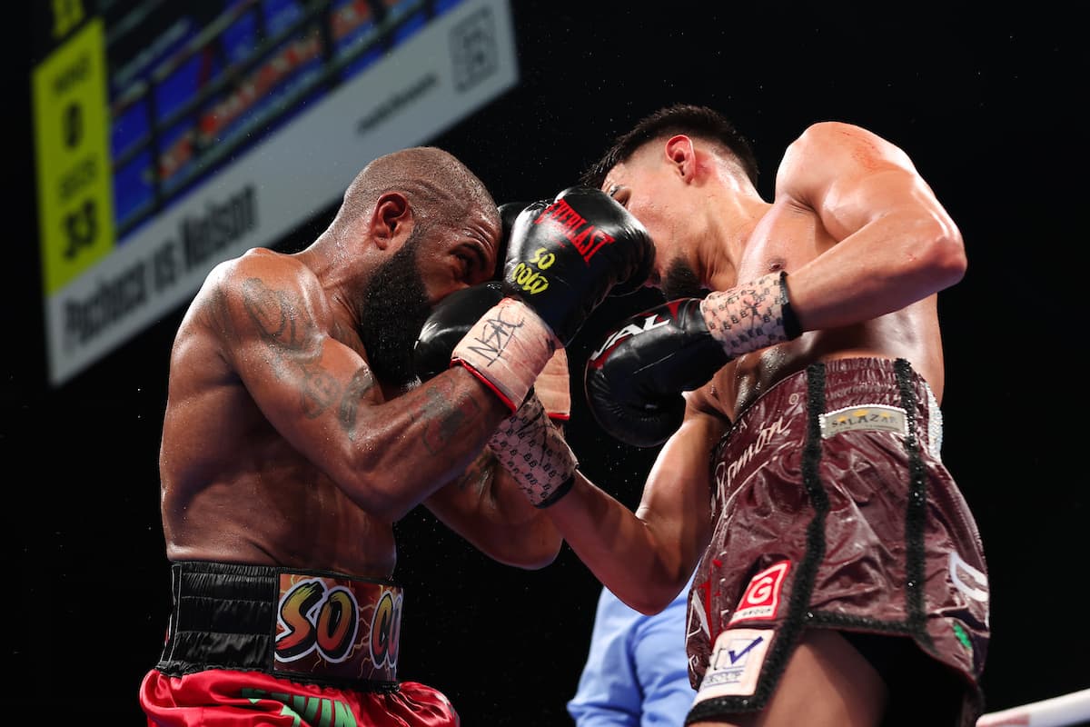 Diego Pacheco throws an uppercut in his bout against Steven Nelson