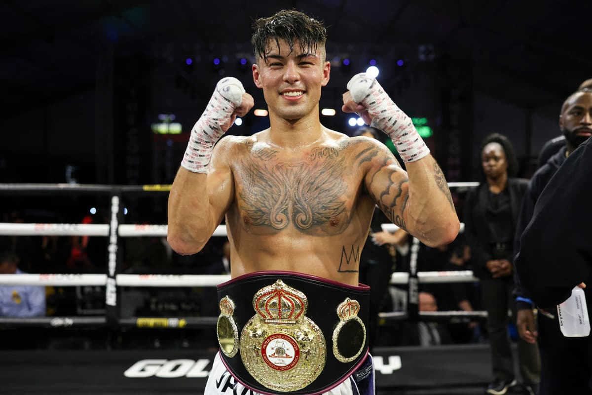 Boxer Eric Priest poses with his belt