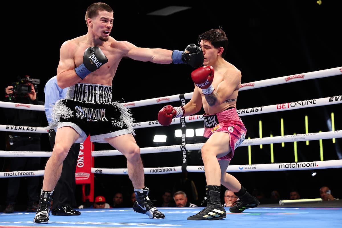 Harley Mederos delivers a left hook during his bout against Arturo de Isla