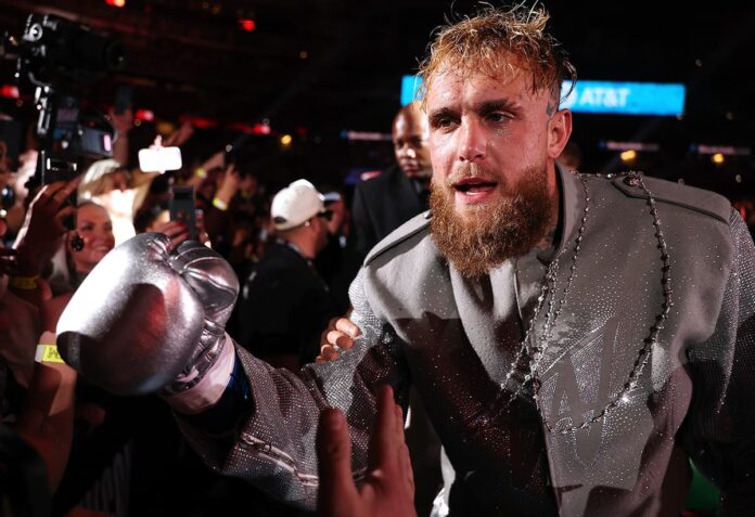 Jake Paul makes his ring entrance for the bout against Mike Tyson