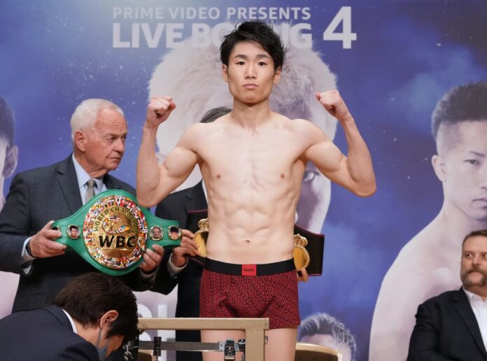 Boxer Kenshiro Teraji poses at the weigh-in ahead of his next bout