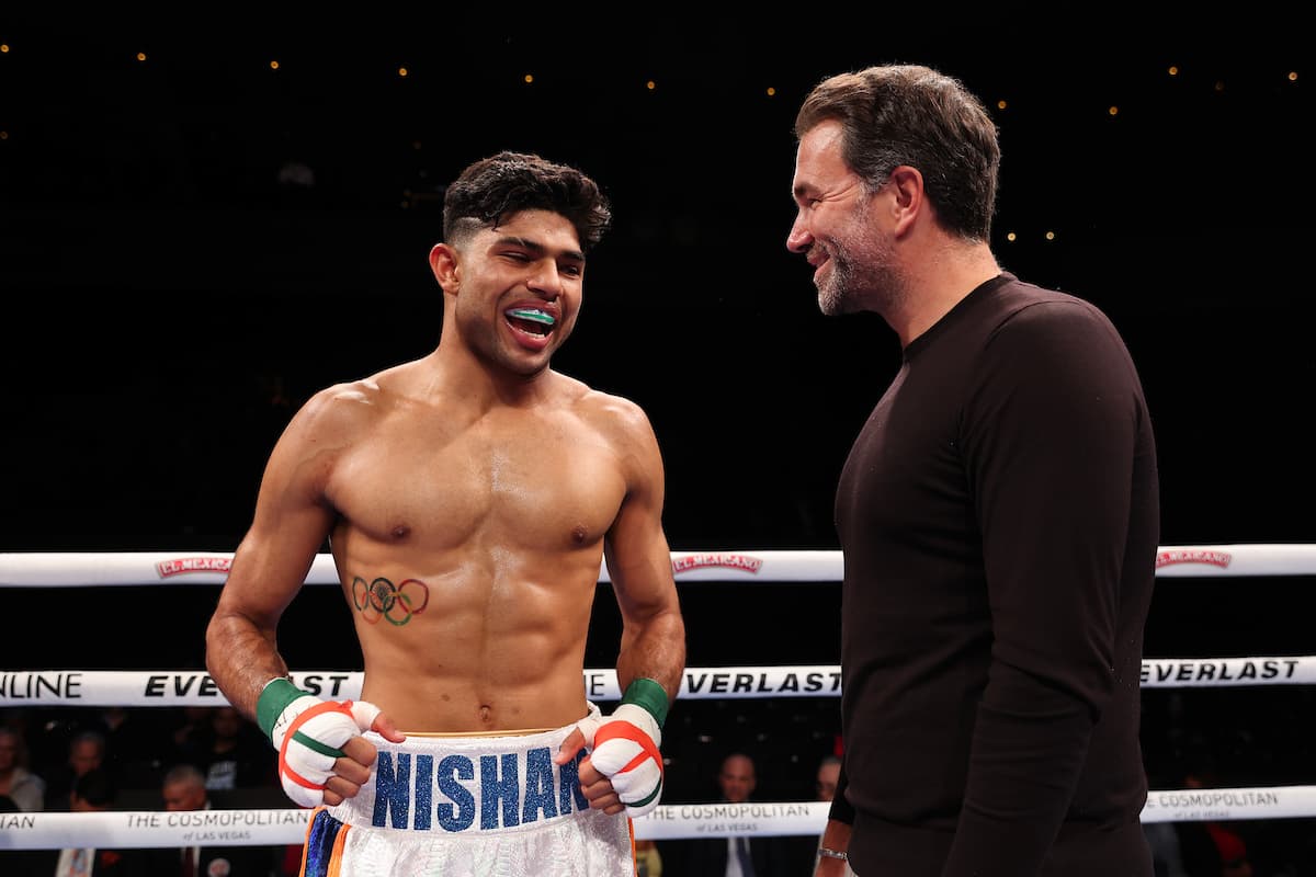 Boxer Nishant Dev and promoter Eddie Hearn