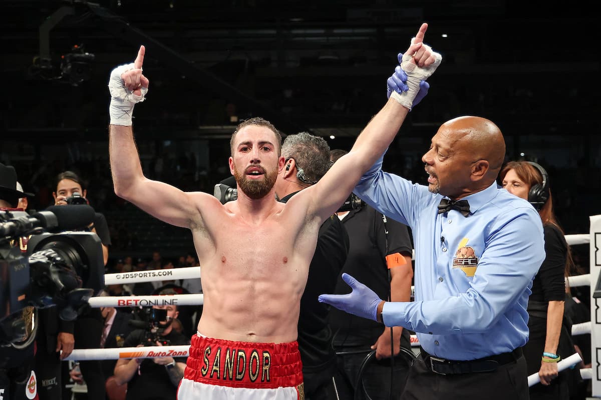 Boxer Sandor Martin has his hands raised in victory