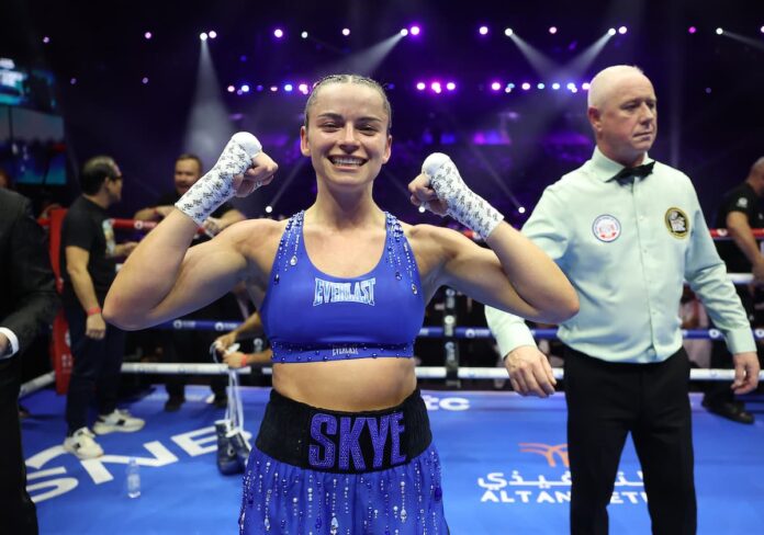 Skye Nicolson poses in a fight stance after her win