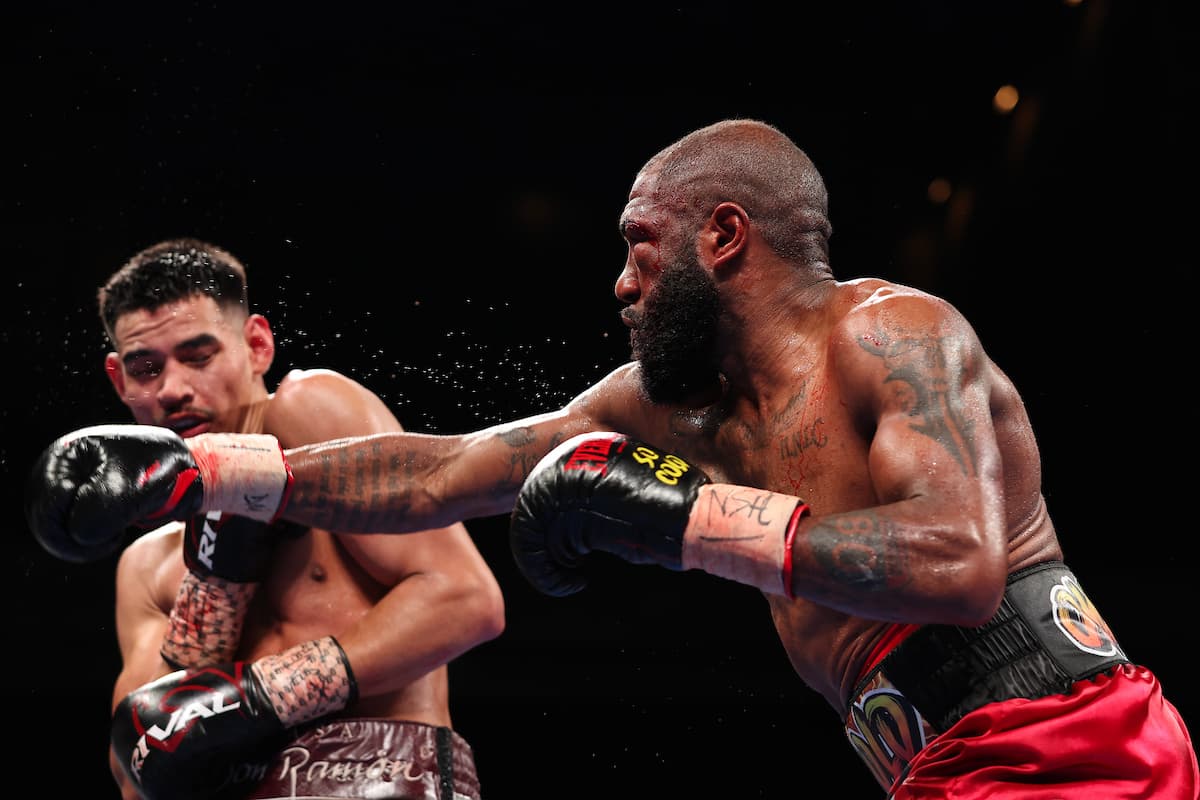 Steven Nelson throws a right punch in his bout against Diego Pacheco