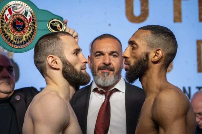 Arthur Biyarslanov and Mohamed Mimoune face each other at the weigh-in ahead of their boxing bout