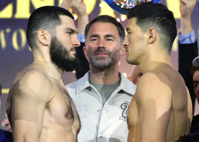 Artur Beterbiev and Dmitry Bivol face each other at the weigh-in ahead of their rematch