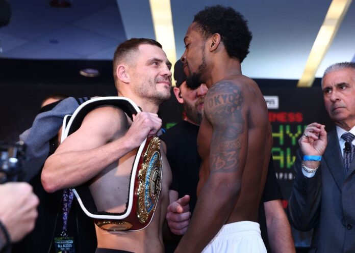 Denys Berinchyk and Keyshawn Davis face each other at the weigh-in ahead of their boxing match