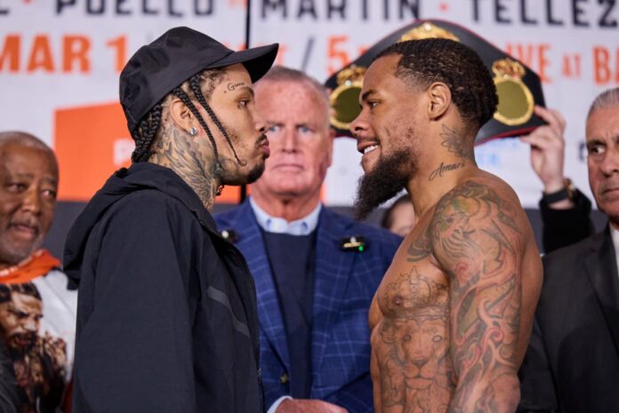 Gervonta 'Tank' Davis and Lamont Roach Jr face each other at the weigh-in ahead of their boxing bout in Brooklyn, New York