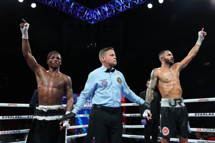 Jose Roman and Jalil Hackett during their boxing match