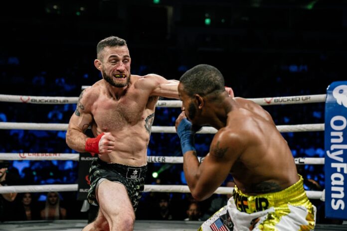 Keith Richardson delivers a punch to Reggie Barnett Jr. during their bare-knuckle boxing bout