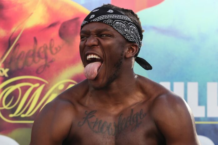 KSI poses at the weigh-in ahead of his boxing bout