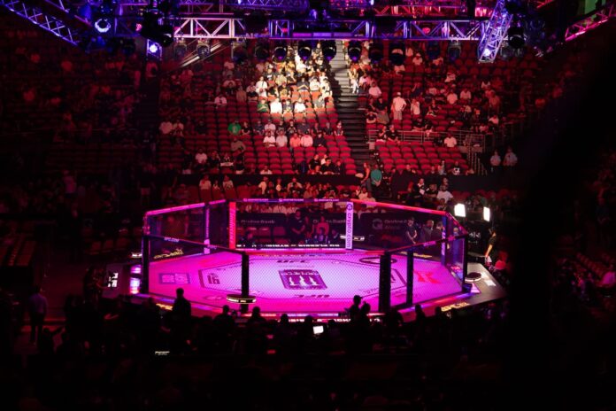 UFC Octagon set up in a venue for UFC 312, showcasing the iconic fighting stage