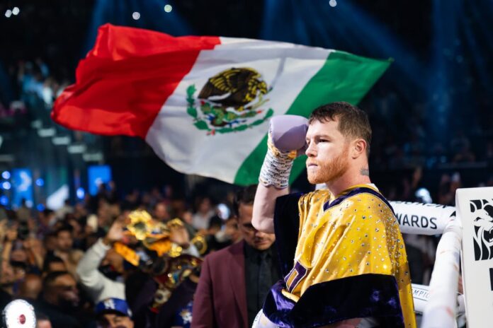 Canelo Alvarez makes his ring walk ahead of his boxing bout against Jermell Charlo