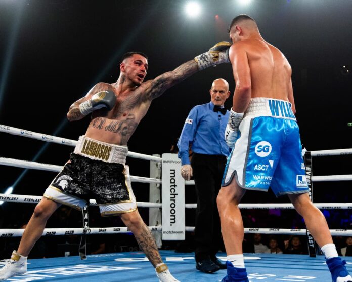 George Kambosos Jr throws a jab during his boxing match against Jake Wyllie