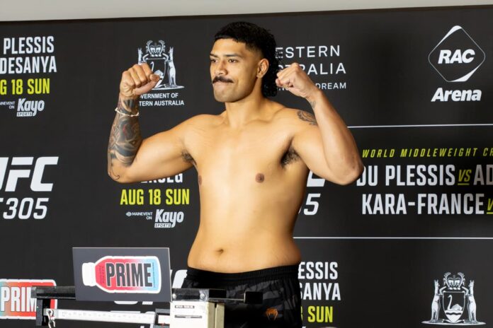 Junior Tafa at the weigh-in ahead of his bout at UFC 305