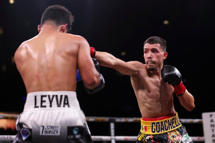 Manuel Flores punches Jorge Leyva during their boxing bout