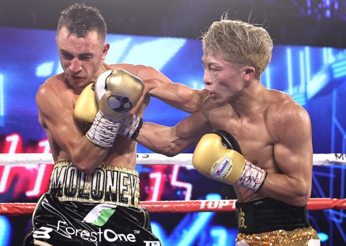 Naoya Inoue punches Jason Moloney during their boxing fight in Las Vegas